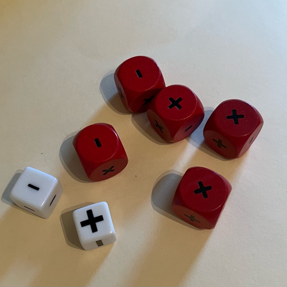 7 dice with math symbols